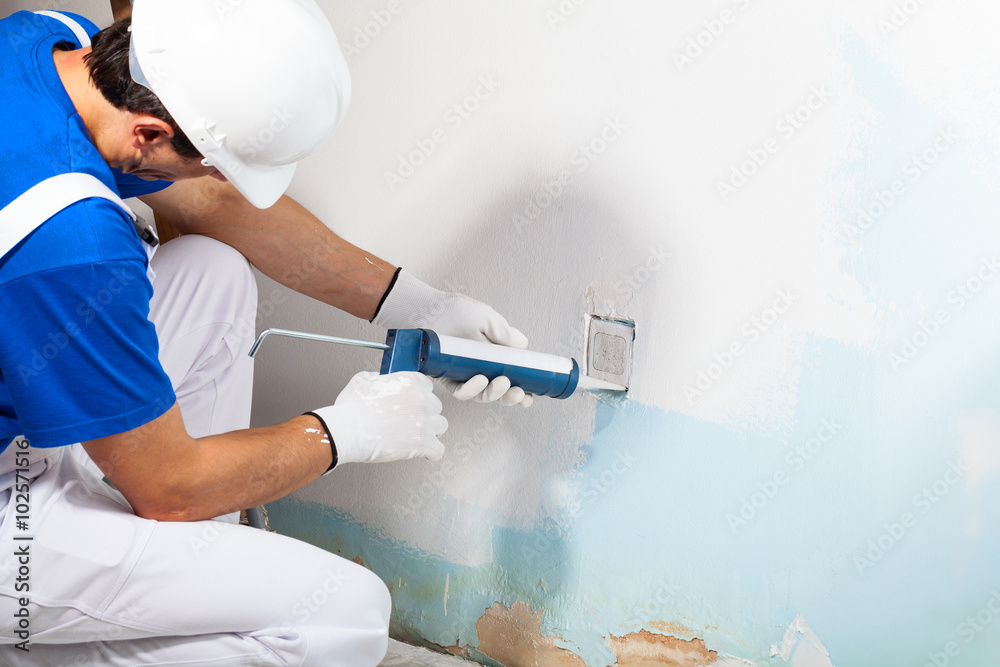 Waterproof caulking sealing cracks, protecting your home from leaks and water damage.