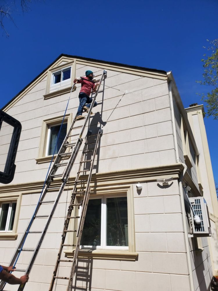 Image of a beautifully finished waterproof stucco exterior, showcasing its durability and aesthetic appeal for homes.