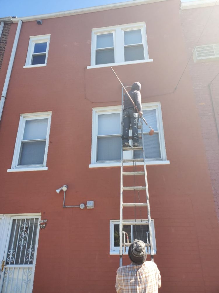 An image showing a home being exterior waterproofed, highlighting the process of creating a dry, leak-free living space.