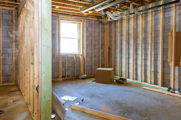 unfinished basement with exposed wood framing and utilities ready for remodeling