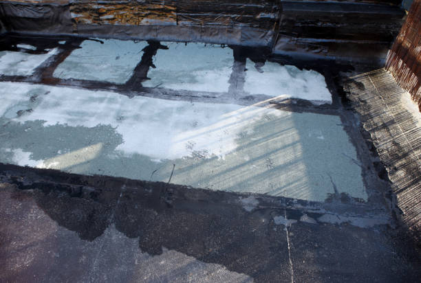 Before and after waterproof roof coating on flat roof in New York City