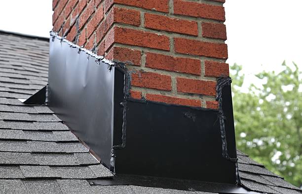 Roof waterproofing around chimney with flashing sealant