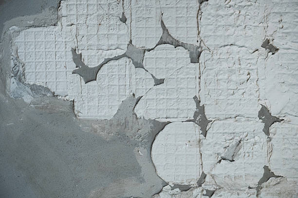 Stucco crack repair services fixing damaged stucco walls and restoring smooth surface finish
