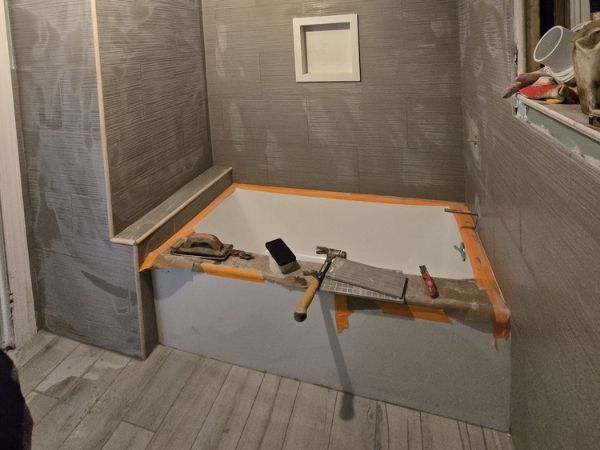 bathroom tile installation by sk group nyc corp