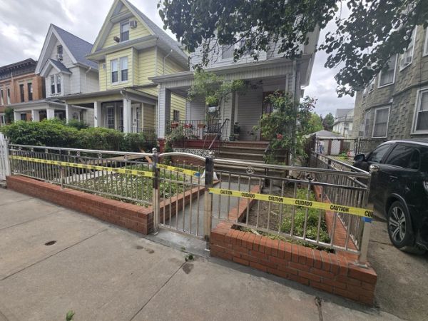 Fence and brick wall installation in NYC by SK Group